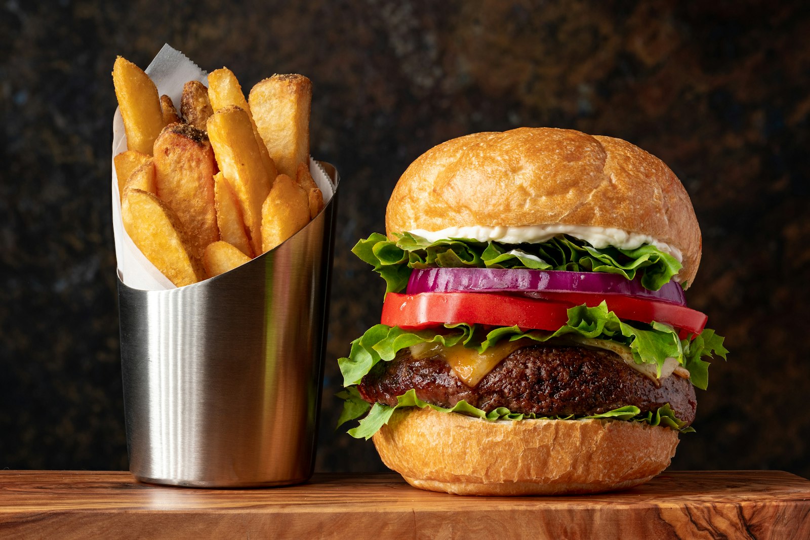 Burger with a cone of fries